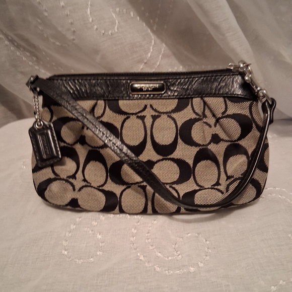 Coach Handbags - Coach Black and Tan Signature Wristlet